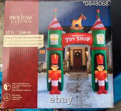 Christmas 12' Tall Airblown Inflatable Santa's Toy Shop Archway Lighted