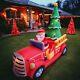 Christmas 9' Wide Airblown Inflatable North Pole Fire Truck Santa Driving Gemmy