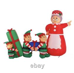 GEMMY Inflatable Mrs. Claus In Charge Scene Elves Elf Boss 7.5 ft Wide Lights Up