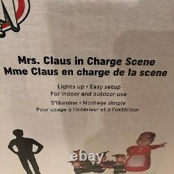 GEMMY Inflatable Mrs. Claus In Charge Scene Elves Elf Boss 7.5 ft Wide Lights Up