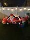 Gemmy Airblown Inflatable 8ft Santa Racer Lighted Christmas Race Car Santa Claus