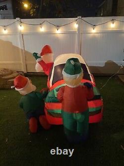 Gemmy Airblown Inflatable 8ft Santa Racer Lighted Christmas Race Car Santa Claus