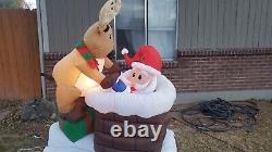 Gemmy Christmas Airblown Inflatable Animated Reindeer Helping Santa 6 ft