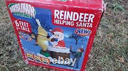 Gemmy Christmas Airblown Inflatable Animated Reindeer Helping Santa 6 ft