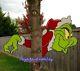 Grinch Tree Peeker 2 Piece Yard Art Christmas Decoration