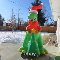 Home Accents Holiday 8ft 6in Lighted Holiday T-Rex With Tree Airblow
