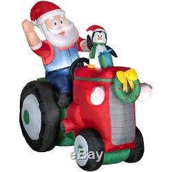 Inflatable Santa On Tractor With Penguin Outdoor Christmas Decor