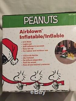Peanuts Snoopy pushing Woodstock on Sleigh Lighted Christmas Inflatable Airblown