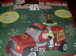 Santa Firetruck Animated Inflatable With Rotating Reindeer With Firehouse