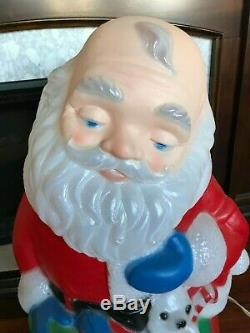 TPI Christmas Blow Mold Kneeling Santa with Baby Jesus Lighted Yard Decorations