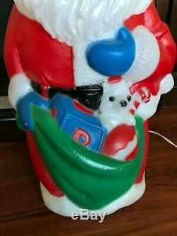 TPI Christmas Blow Mold Kneeling Santa with Baby Jesus Lighted Yard Decorations