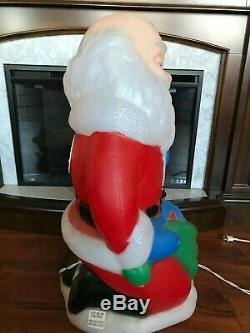 TPI Christmas Blow Mold Kneeling Santa with Baby Jesus Lighted Yard Decorations