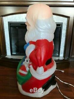 TPI Christmas Blow Mold Kneeling Santa with Baby Jesus Lighted Yard Decorations