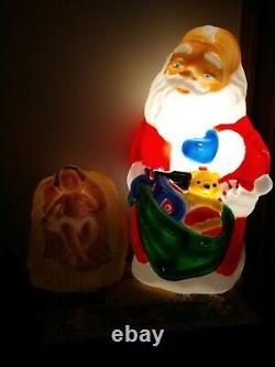 TPI. Kneeling Santa Blow Mold WithBaby Jesus blow mold yard light