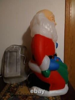 TPI. Kneeling Santa Blow Mold WithBaby Jesus blow mold yard light