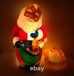 Vintage TPI. Kneeling Santa Blow Mold 27 WithBaby Jesus blow mold yard light